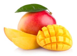 sliced mango and a whole mango
